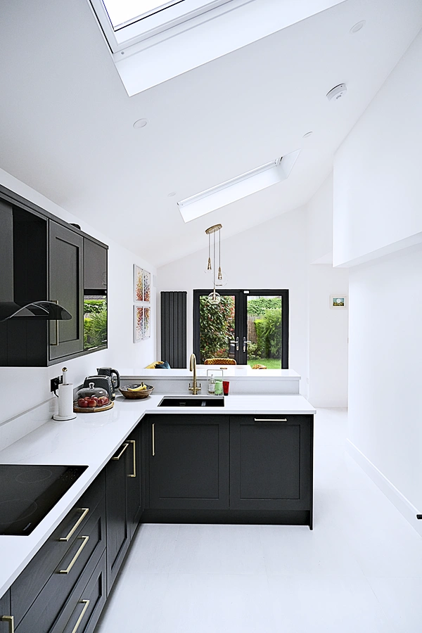 Quickview long fitted kitchen with skylight